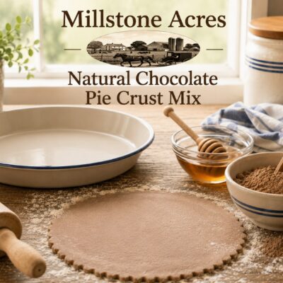 Millstone Acres Natural Chocolate Pie Crust Mix with light cocoa powder, honey, an empty pie pan, rolling pin, and baking ingredients in a bright farmhouse kitchen.