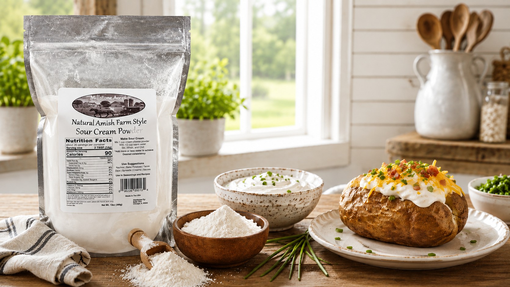 Millstone Acres Natural Sour Cream Powder package beside sour cream powder, creamy dip, and a loaded baked potato in a bright farmhouse kitchen.