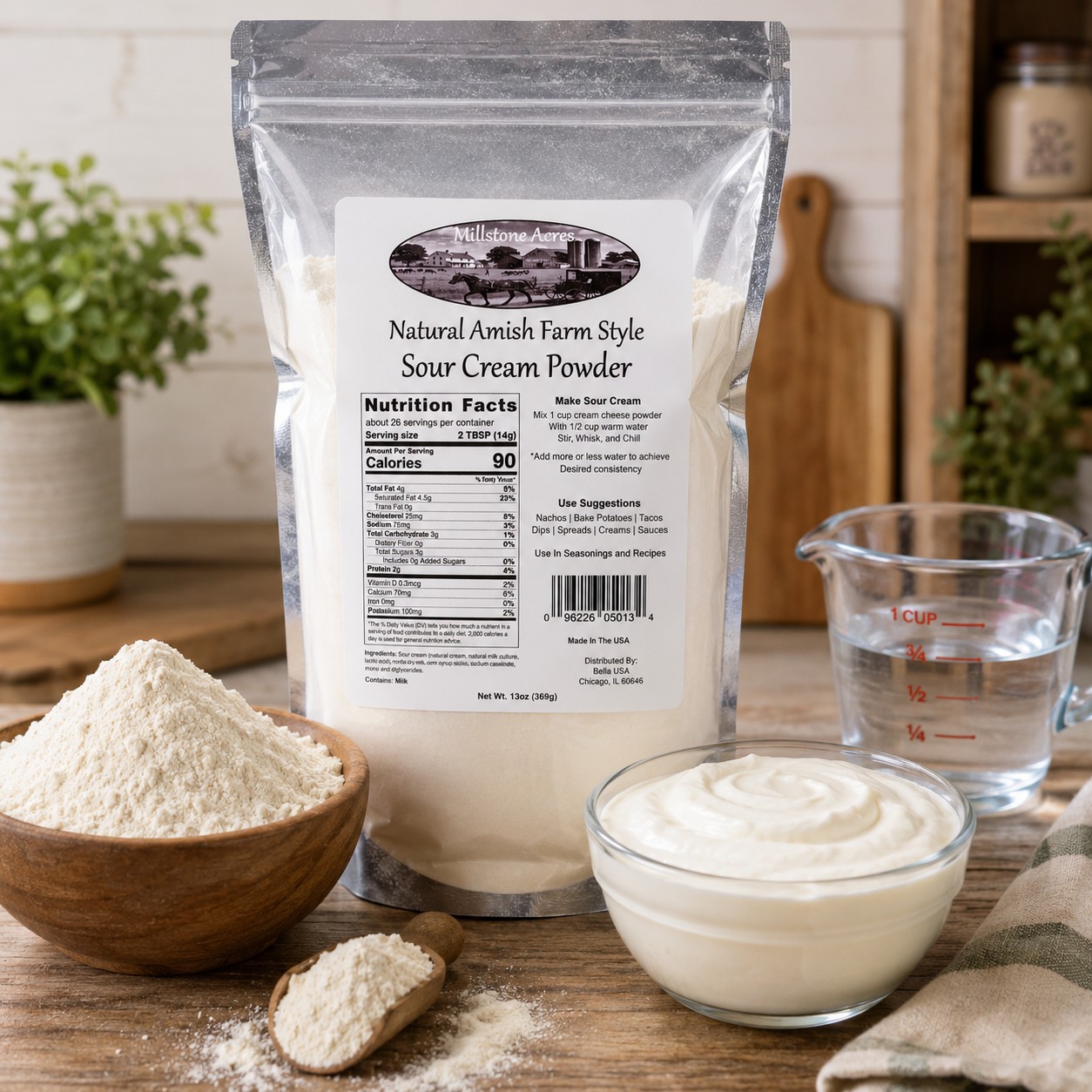 Millstone Acres Natural Sour Cream Powder displayed with water, sour cream powder, and freshly reconstituted sour cream in a farmhouse kitchen.