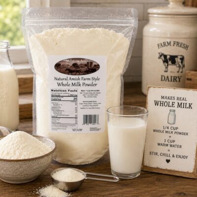 Millstone Acres Natural Whole Milk Powder displayed with a bowl of milk powder, measuring scoop, glass of milk, and farmhouse recipe card showing how to mix whole milk powder.